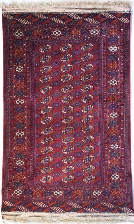 Foto esempio di un tappeto Bukara Russo originale a fondo rosso