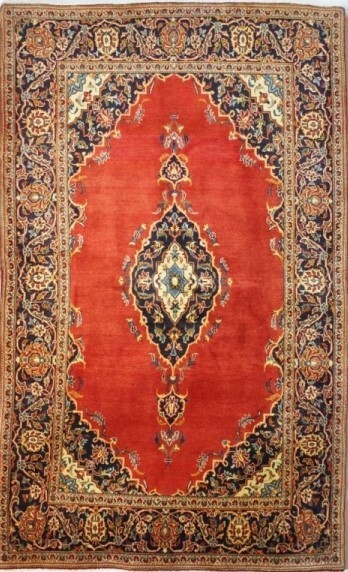 Foto esempio di un tappeto persiano Kashan con fondo rosso e cornice blu