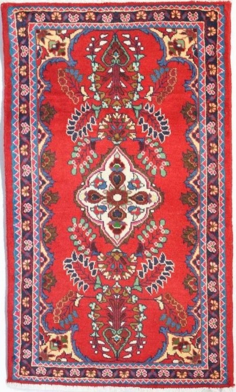 Foto esempio di un tappeto perisno Lilian fondo rosso e cornice scura