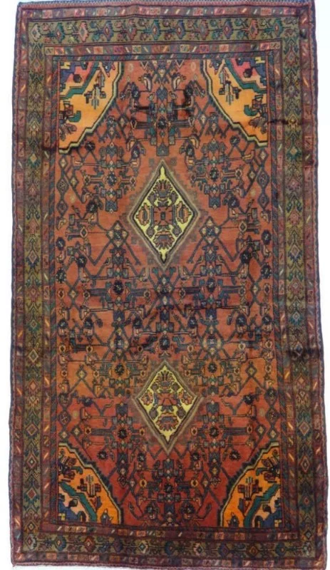 Foto esempio di un tappeto persiano Sirjan con fondo rosso e cornice verde